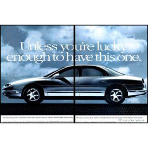 1995 Oldsmobile Aurora Sedan 2 Page Vintage Print Ad Gray Clouds Wall Art Photo